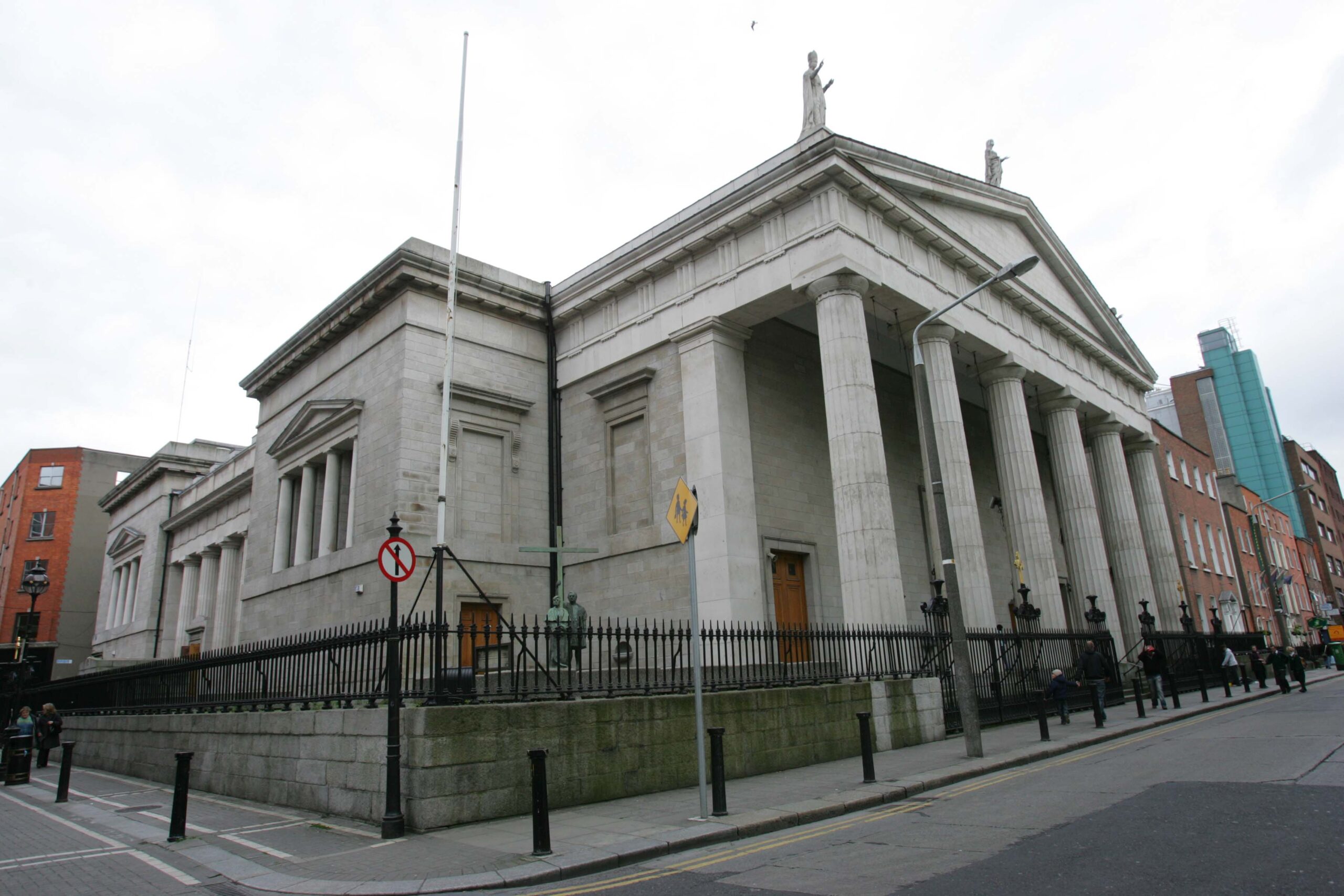 Street view of classical building with columns