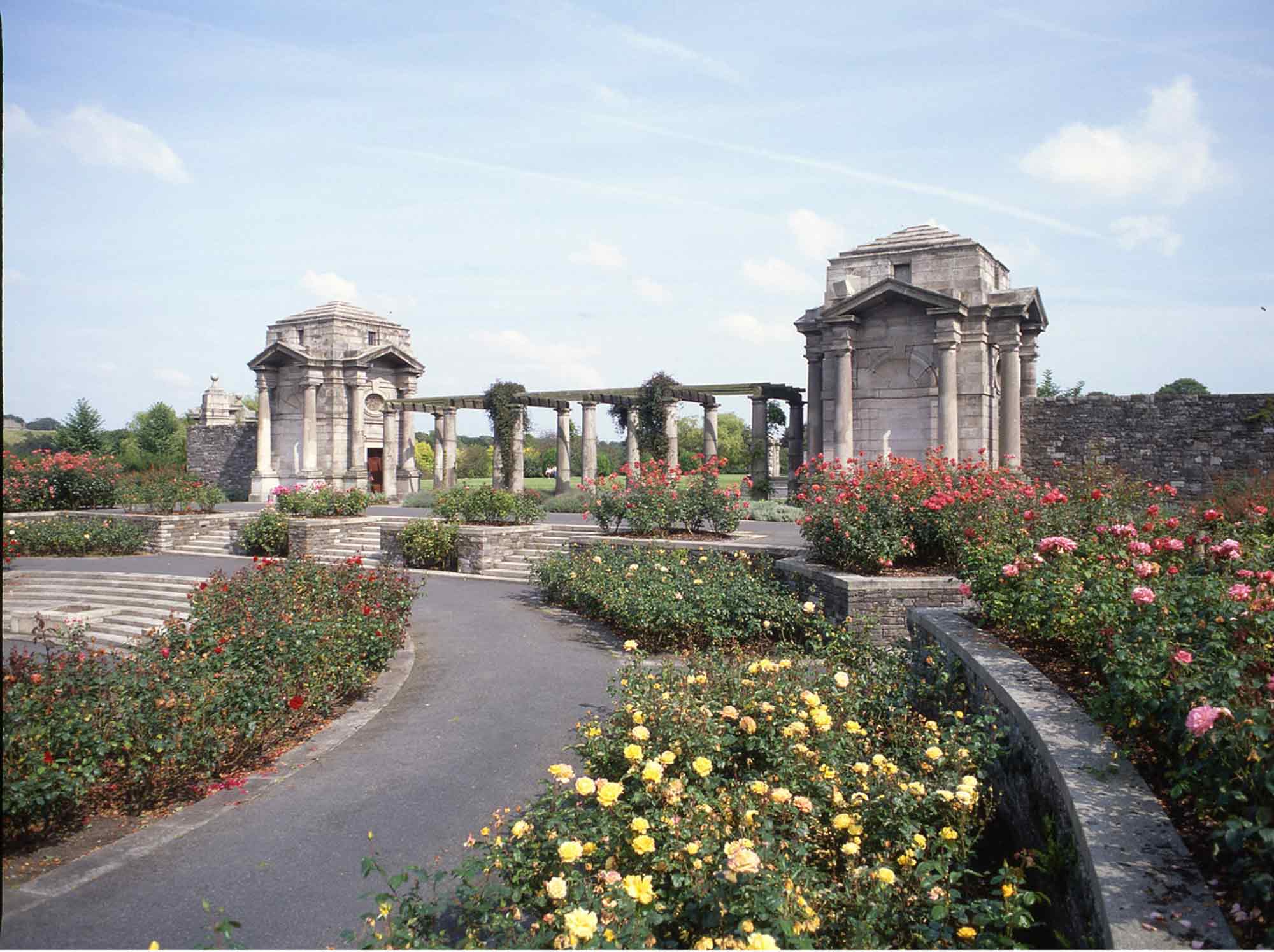 War memorial Gardens pergola flanked by 2 granite pavilions with sunken rose garden in foreground.