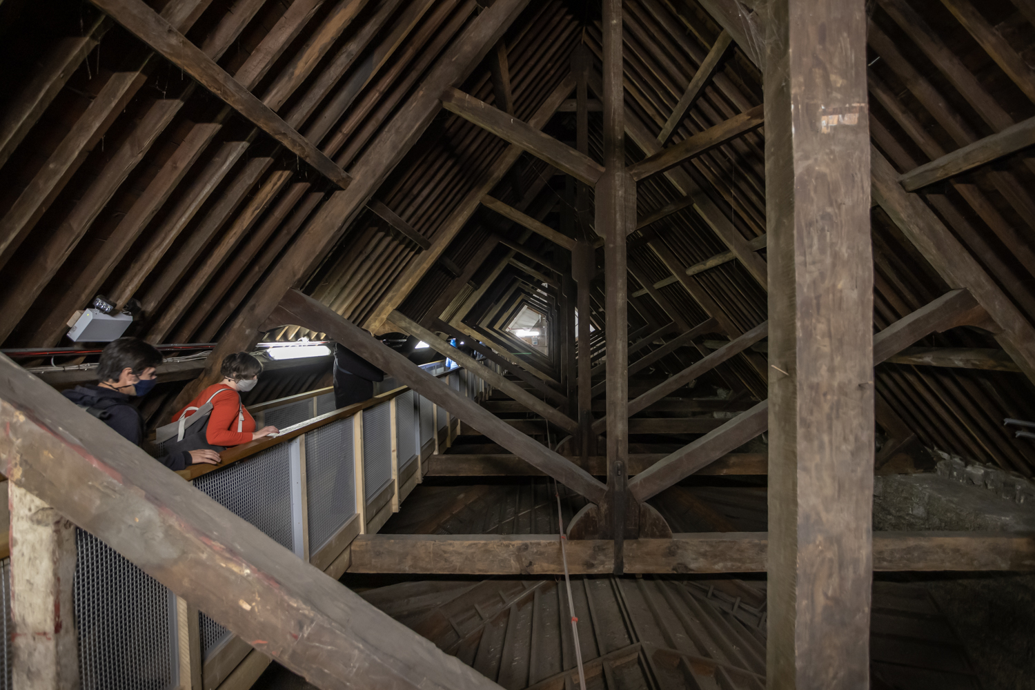 Medieval Cathedral wooden attic structure with visitors