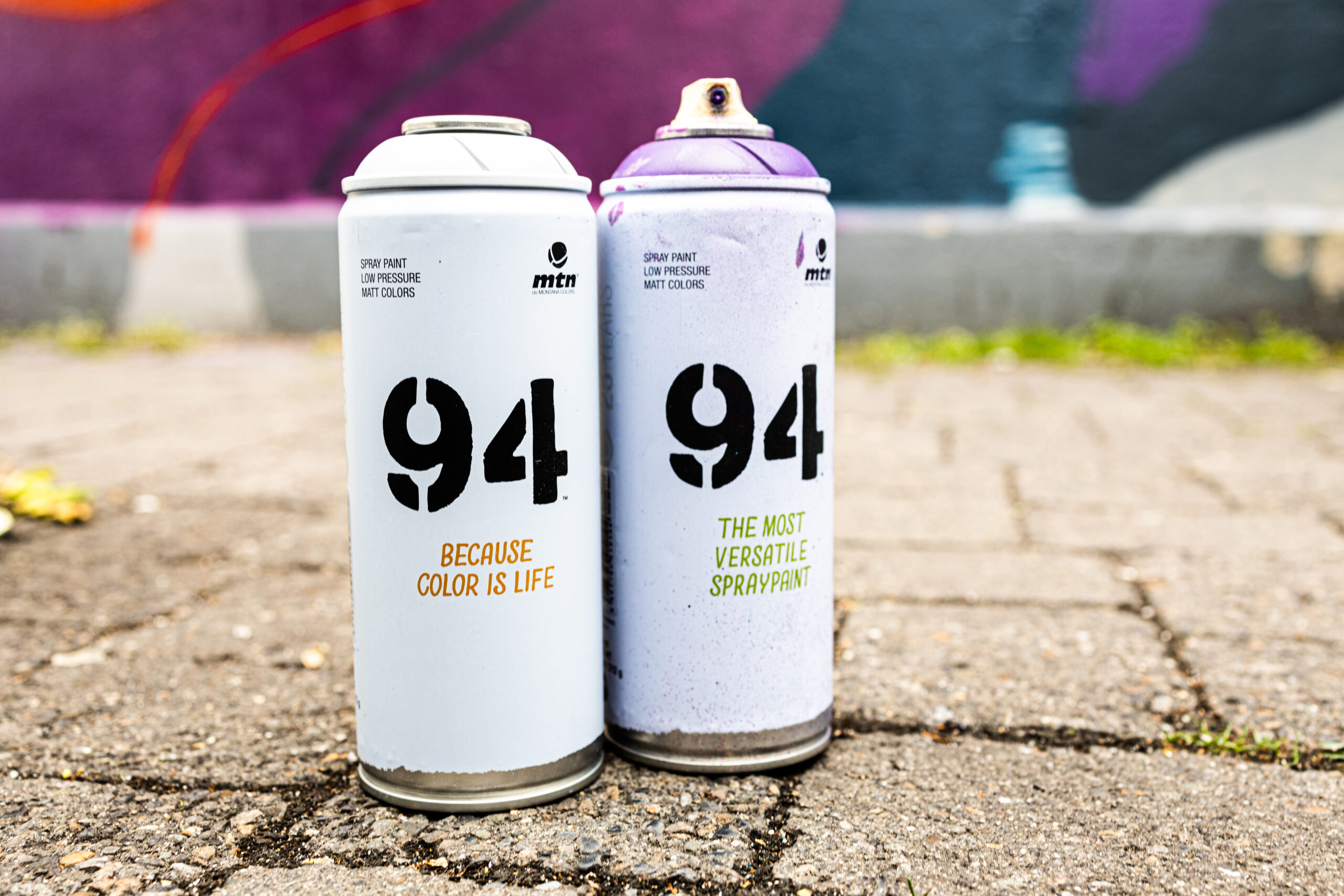 Two cans of spray paint for graffiti art